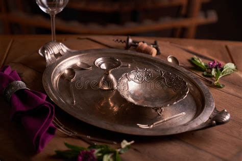 Empty Vintage Metal Dishes On A Vintage Metal Tray On A Wooden