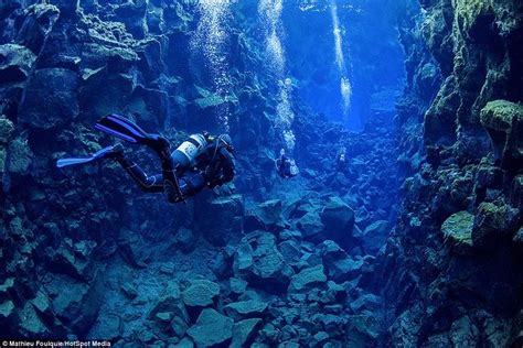 The Breathtaking Photos Of A Diver Swimming Between Two Continents Plate Tectonics Underwater