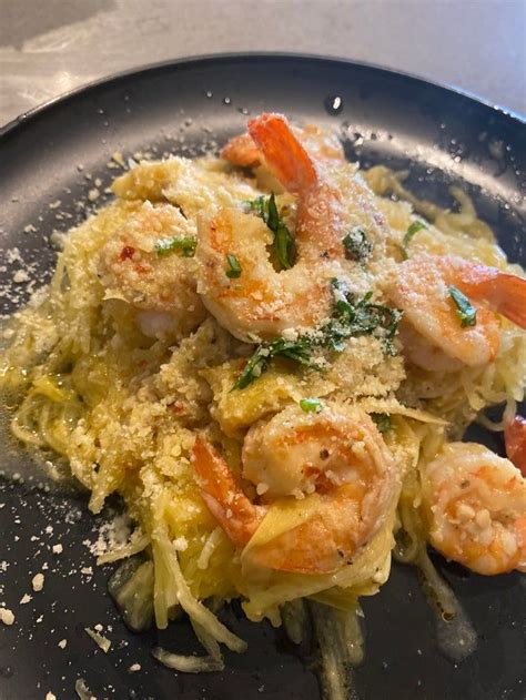 When you cut the squash lengthwise, you cut each strand in half, which makes for shorter, and often soggy, spaghetti. try this instead: Spaghetti squash shrimp scampi! To die for!! - ketorecipes in 2020 | Spaghetti squash shrimp ...