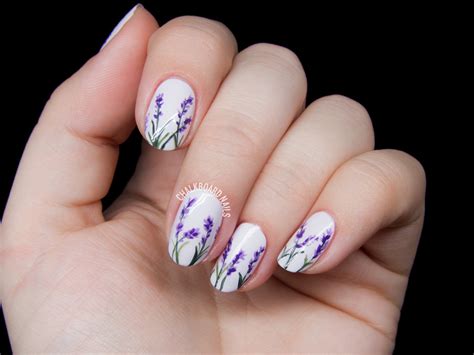 This art can be created easily by giving a light base color on the nails and then making some polka dots with the dotting tool or with the help of pick's blunt end. Lavender Blossoms Floral Nail Art | Chalkboard Nails ...