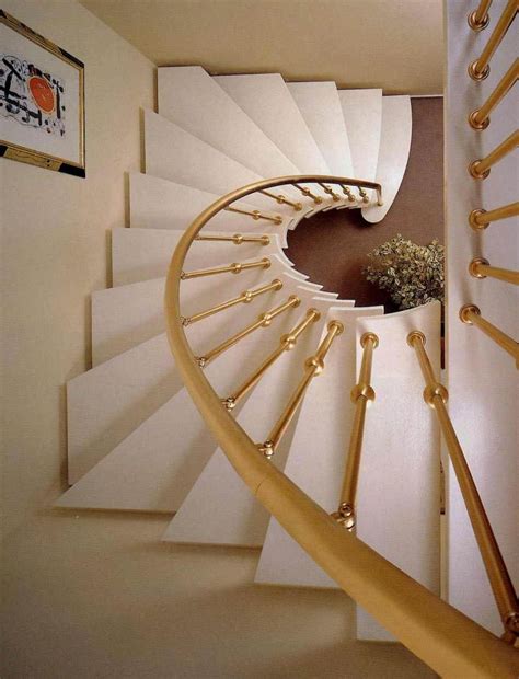 The stairs are fitted with a shiny stainless steel railing that completes the modern look of the design. 40 Breathtaking Spiral Staircases To Dream About Having In ...