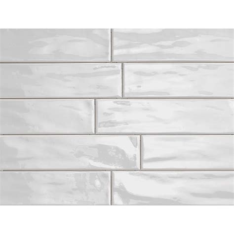 Installing a subway tile backsplash into your kitchen provides both an updated look (that will never go out. Organic Brick 3" x 12" Porcelain Subway Tile in Ice Shiny ...