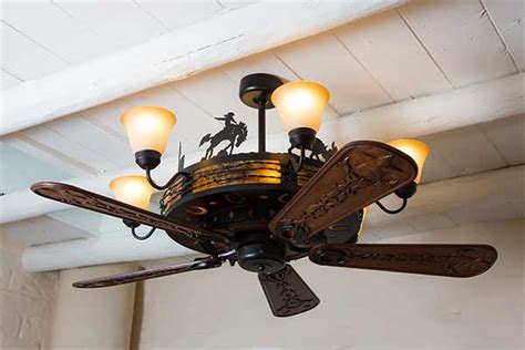 The craftsman rustic ceiling fan comes in a dark bronze finish. Copper Canyon Rancher Ceiling Fan - Rustic Lighting and Fans