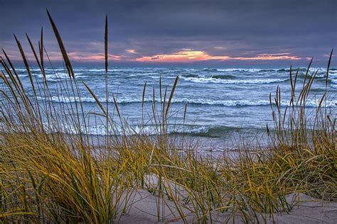 Sunset On The Beach At Lake Michigan With Dune Grass Photograph By