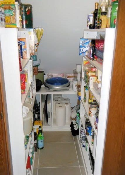 Eight years ago we completely remodeled our kitchen and made huge improvements, but the one thing we left undone was the pantry closet that the builder put in. Pantry Under Stairs in White | Under stairs cupboard ...