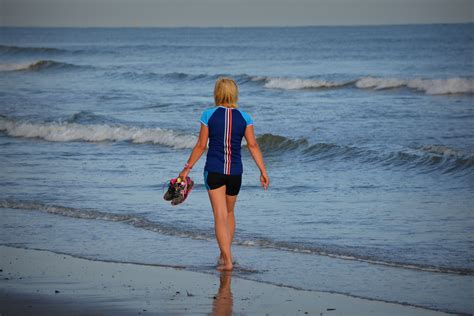 Woman Walking On The Beach Free Image Download