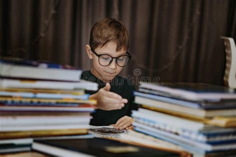 Cute Caucasian Boy Wearing Glasses Reading A Book Cheerful Boy Peeking
