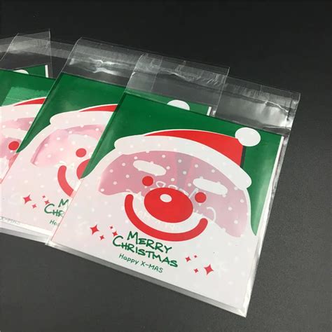 100pcs Santa Claus Plastic Self Adhesive Cookie Bags T Candy Bag Cookie Packaging Bags