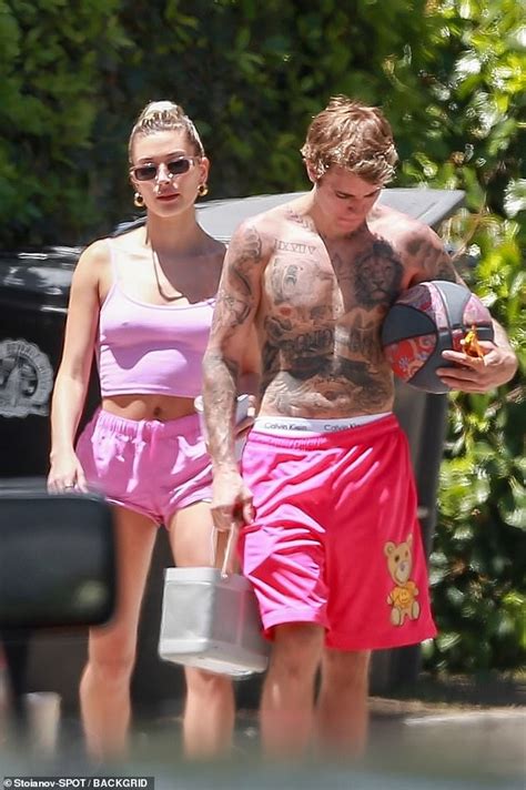 Hailey Bieber Rocks Pink Crop Top With Tiny Shorts As She Joins Her