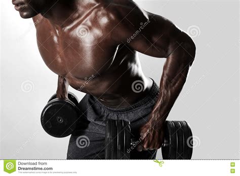 Fit Young Man Exercising With Dumbbells Stock Image Image Of Muscles