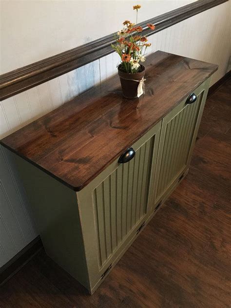 Pull trash bin cabinet are great for disposal of all types of materials be it paper, plastics or even medical waste. Double Trash Bin, Tilt Out Door, Wood Trash Recycle Bin ...