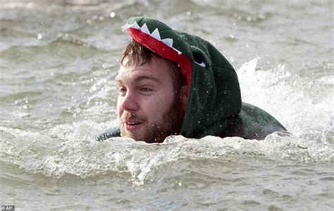 People All Over The World Participate In Polar Bear Plunges Across The