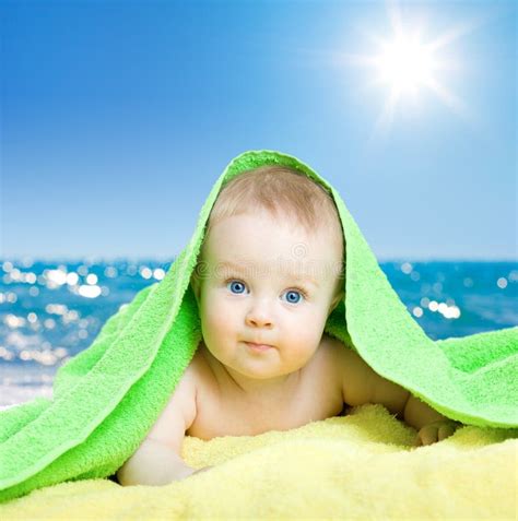 Adorable Baby In Colorful Towel On Sea Beach Stock Photo Image Of