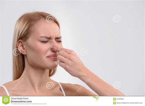 Young Woman Feeling Disgust About Scent Stock Photo Image Of Negative