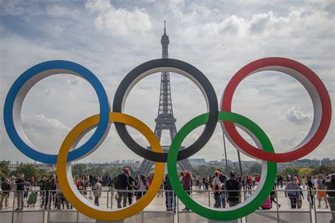 France is currently competing at the 2020 summer olympics in tokyo. Olympic Rings around the Eiffel Tower image - Free stock ...