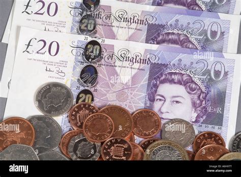 New Twenty Pound Banknotes Uk Currency Coins Stock Photo Alamy