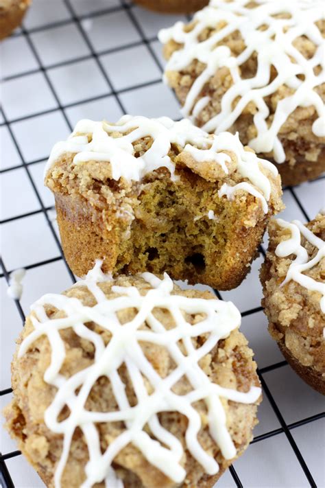 Pumpkin Muffins With A Streusel Topping And Cream Cheese Icing
