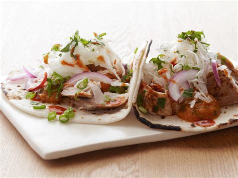 Here, the celebrity chef shows how to prepare this delicious entree along with red cabbage slaw and three mouthwatering. Healthy Fish Tacos Recipe | Bobby Flay | Food Network