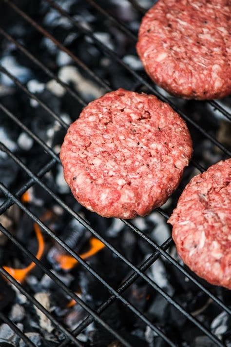 Maybe you would like to learn more about one of these? ground beef burger patties on grill uncooked | Beef ...