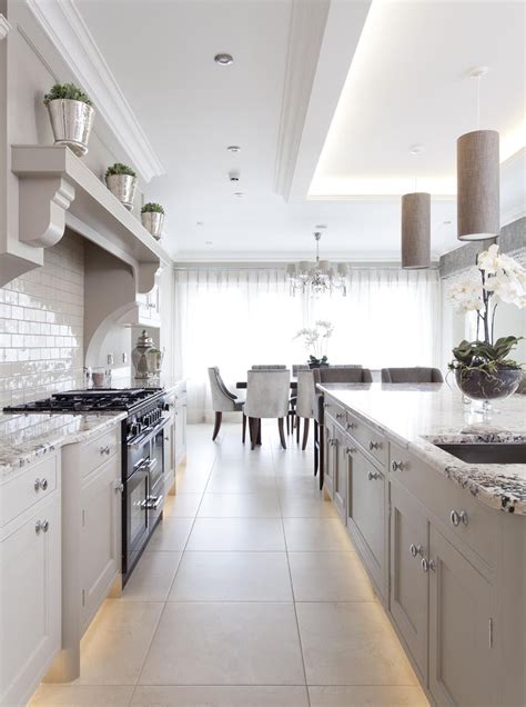 A kitchen bar is useful and multifunctional for any kitchen but especially a kitchen on the smaller side. Hand painted bespoke kitchen www.canavaninteriors.co.uk ...