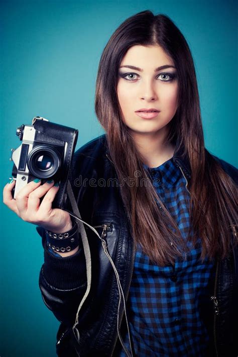 Beautiful Young Woman Holding Camera Stock Photo Image Of Jacket