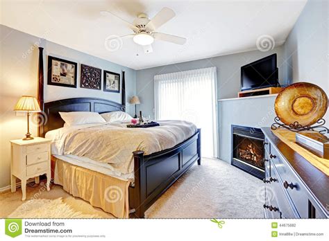 Maybe you would like to learn more about one of these? Master Bedroom With Fireplace And TV Stock Photo - Image ...
