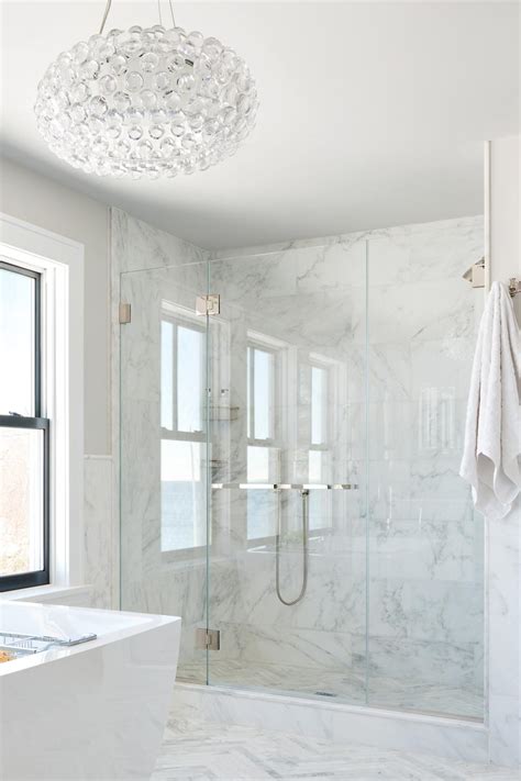 See more ideas about marble bathroom accessories, bathroom accessories, marble bathroom. Marble Master Bathroom Shower With Glass Doors | HGTV