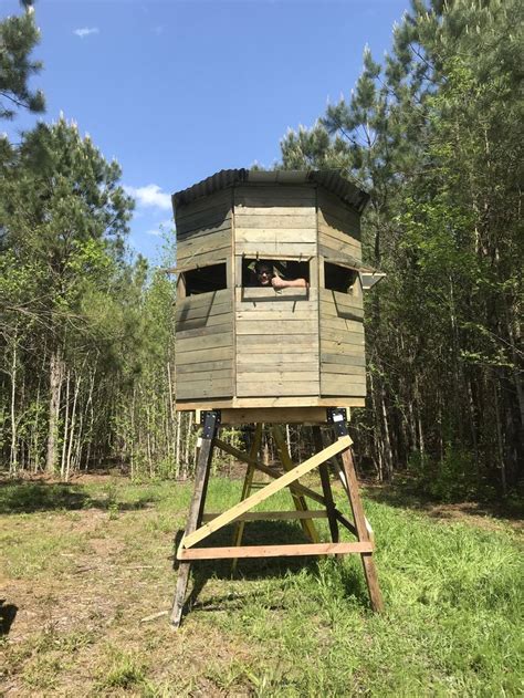 Octagonal Deer Blind Built From Palletwood Sitting On A 6 Tower Stand