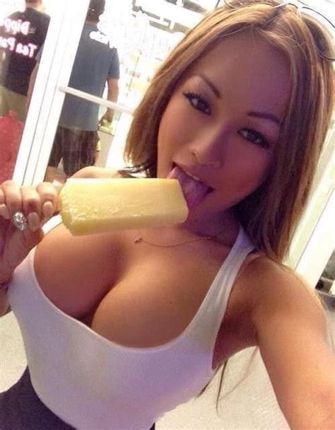 Busty Asian Girl Licking Ice Cream Porn Pic