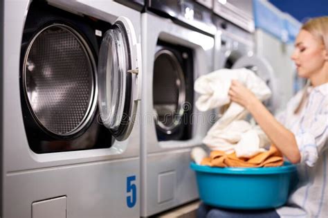 Young Woman Doing The Daily Chores Laundry Female Folded Clean