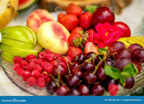 Berries And Fruit In A Transparent Plate Apples Pears Cherries