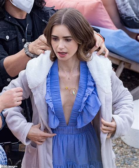 Lily Collins Rocks A Blue Dress While Filming Emily In Paris Lily