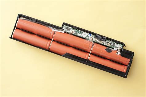 Free Stock Image Of Disassembled Laptop Battery On Yellow Background
