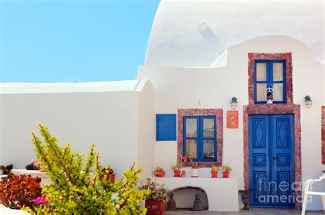 Traditional Greek House With Blue Door And Windows Santorini Greece