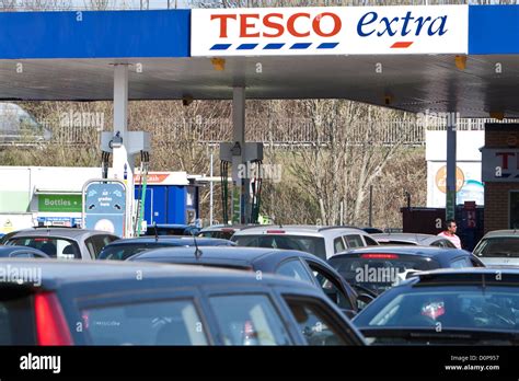 Fuel Crisis In Uk Cars Queue For Fuel At Tesco Store And Petrol