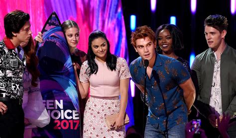 KJ Apa Accepts Surfboard For Riverdale At Teen Choice Awards