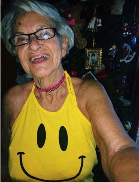 4k00:16young overweight man taking care of his sick mom sitting together on couch. Happy New Year from the 'baddest granny on Instagram ...