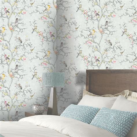 This beautiful chinoiserie birds wallpaper features an intricate design of birds perched amongst delicate grey tree branches and pretty flowers in tones of pink and cream. Statement Ornithology Blue Birds Wallpaper | Bird ...