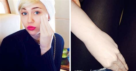 Miley Cyrus Rubs Face And Crotch With Hand Sex Toy And Shares Pics