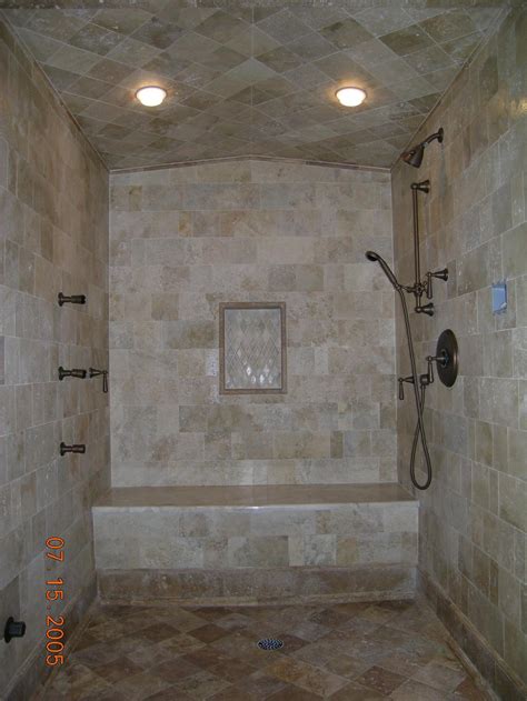 Above a shower, yes, of course, but not above a bathtub. Stephenson Tile Co. - Naples Tile Showers