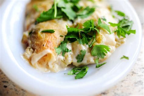 Whether her perfect pot roast, white chicken enchiladas, or smothered pork chops, you'll come out of dinnertime on top and reeling with praise every time. White Chicken Enchiladas | The Pioneer Woman