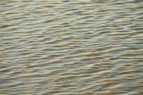 Texture Of Glitter Water And Soft Waves Sparkling In Water
