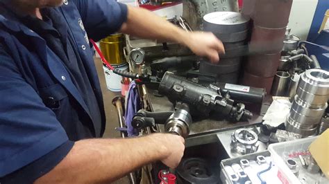 Apply grease to the face of the sector shaft and position the pitman arm puller on the center line of the sector shaft. HOW TO REMOVE A PITMAN ARM - Part 1 FORD - YouTube