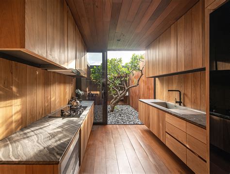 Warchitect Built A Borderless Wooden Residence On Rooftop In Bangkok