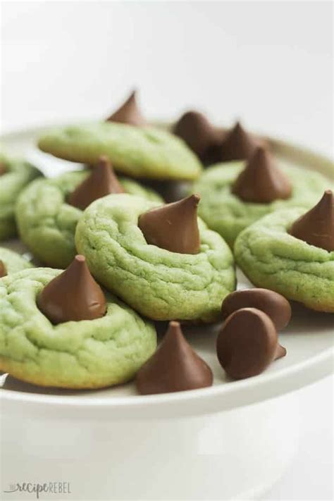 Hershey's kiss cookies are the perfect combo of chewy chocolate cookie and hershey kiss candies. These Mint Hershey Kiss Cookies are the perfect Christmas ...