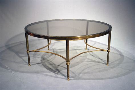Coffee tables can be used to display a small stack of your favorite books, a vase a fresh flowers or a beautiful centerpiece bowl. Antiques Atlas - Large Brass Round Coffee Table