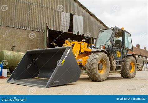 Construction Digger Loader In Farm Yard With Barn Editorial Stock Image