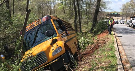 Greenville County school bus crashes into ditch
