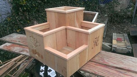 One minute video on how to plant herbs in a three tier garden box. Three tier wirh tree and H cutout.... www.facebook.com ...