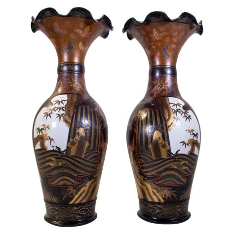 unusual pair of tall lacquered and incised chinese floor vases at 1stdibs